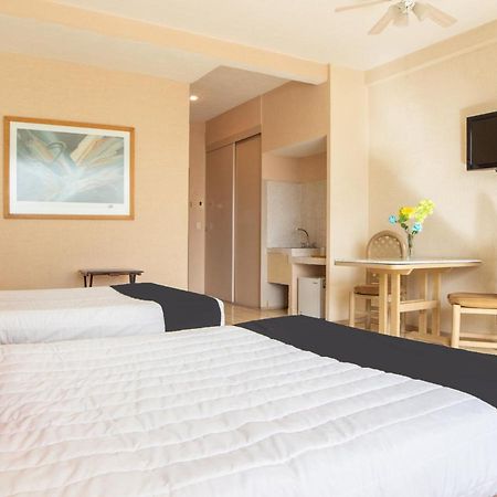 Capital O Hotel Villa Monini Puebla Bagian luar foto