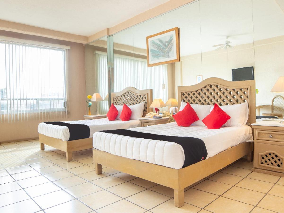 Capital O Hotel Villa Monini Puebla Bagian luar foto