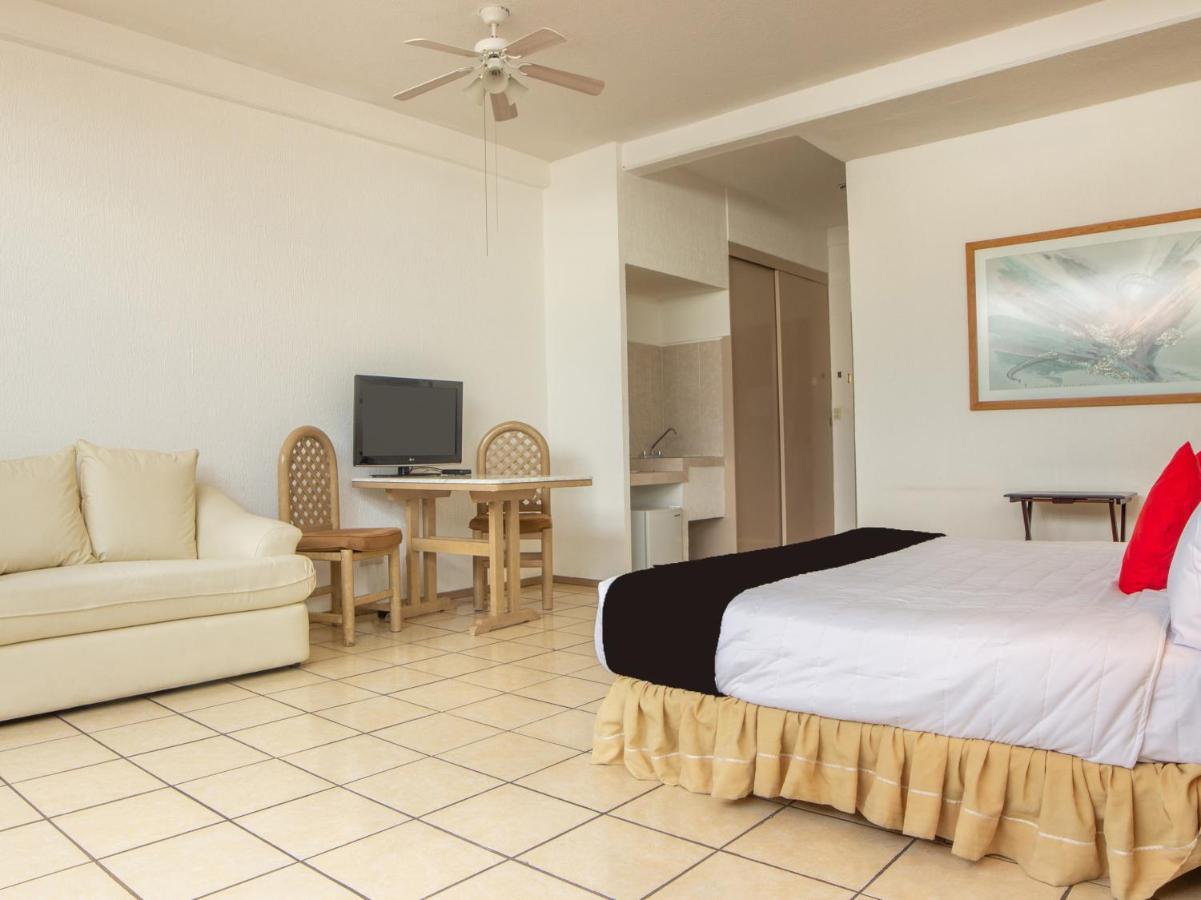 Capital O Hotel Villa Monini Puebla Bagian luar foto