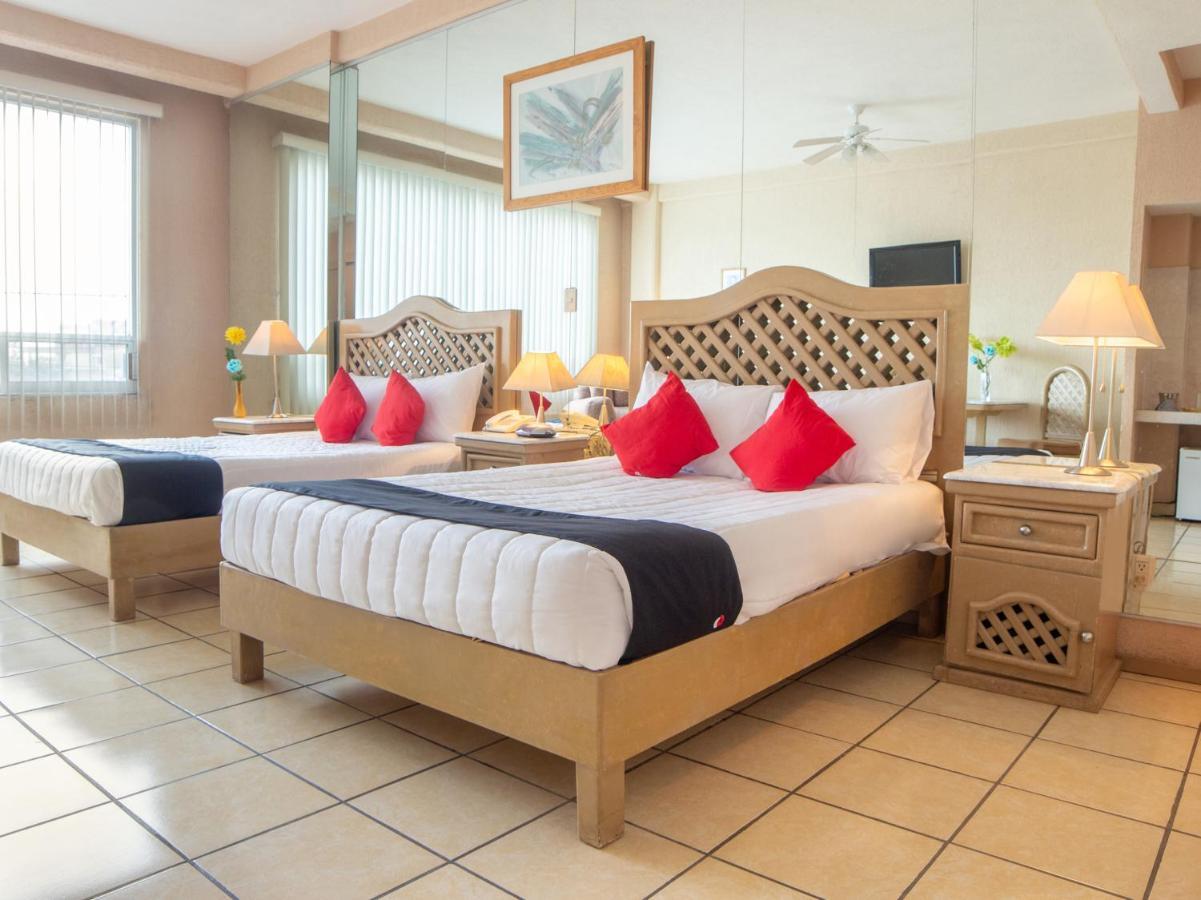 Capital O Hotel Villa Monini Puebla Bagian luar foto