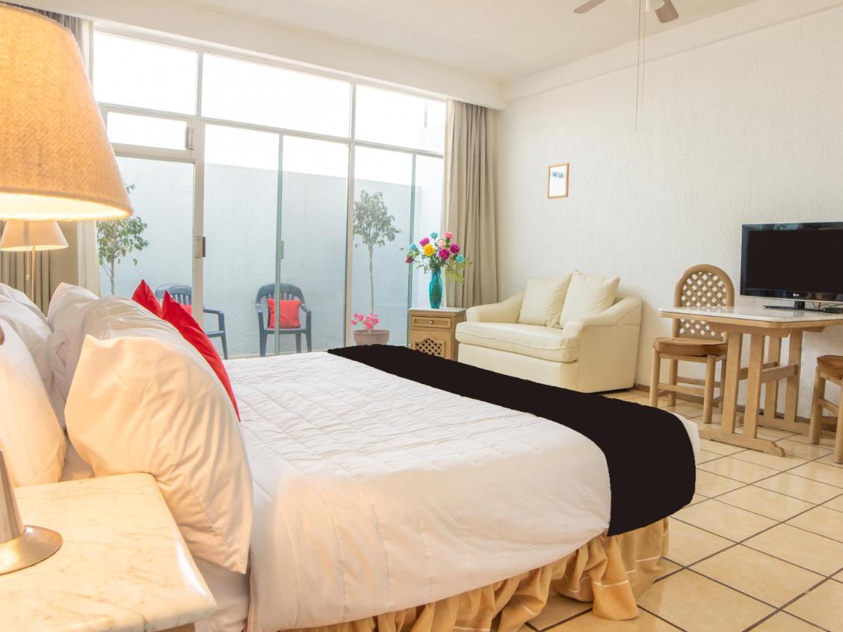 Capital O Hotel Villa Monini Puebla Bagian luar foto