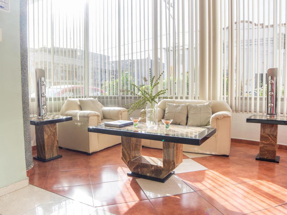 Capital O Hotel Villa Monini Puebla Bagian luar foto