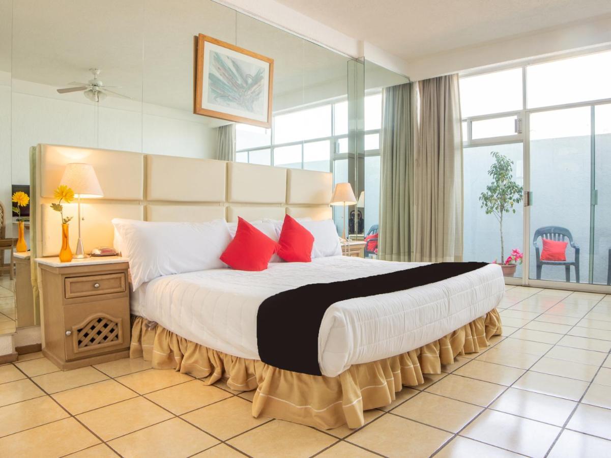 Capital O Hotel Villa Monini Puebla Bagian luar foto