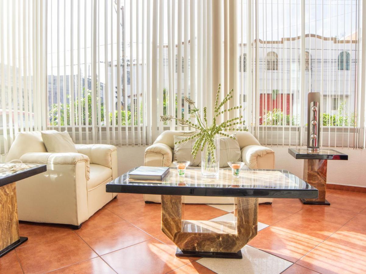 Capital O Hotel Villa Monini Puebla Bagian luar foto